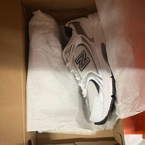 New Balance White and Black Sneakers